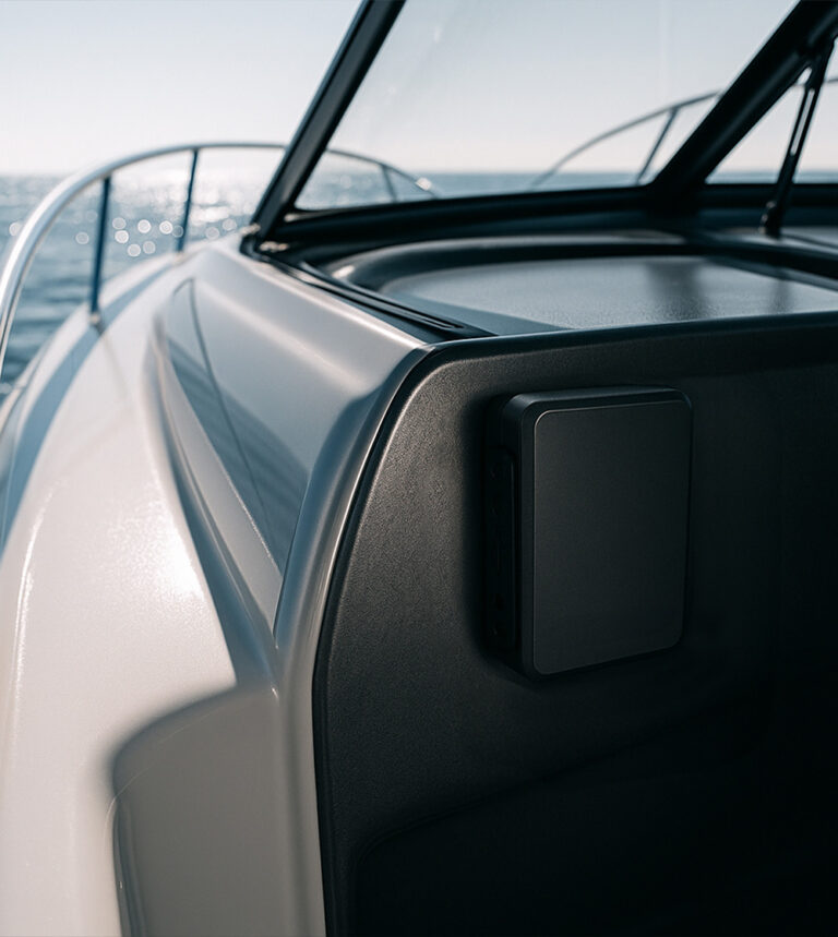 Boat at sea using MiniFinder Xtreme GPS tracker for marine tracking and safety.