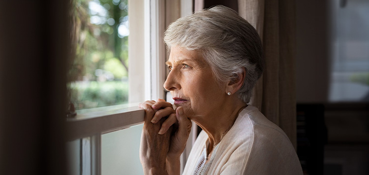 Senior wearing the MiniFinder Watch with fall alarm, panic button and easy contact with family members.
