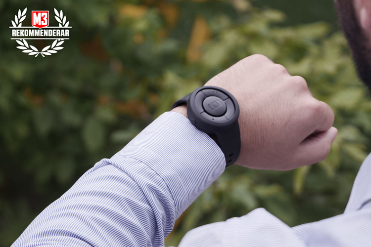 MiniFinder Nano Mobile Safety Watch on a mans wrist.