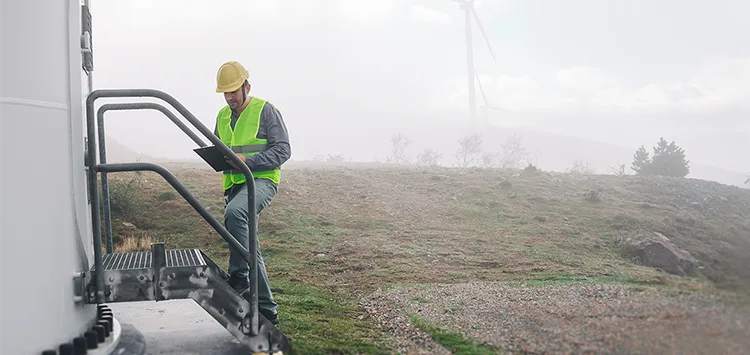 A lone worker using the top rated GPS personal alarm Nano for added safety
