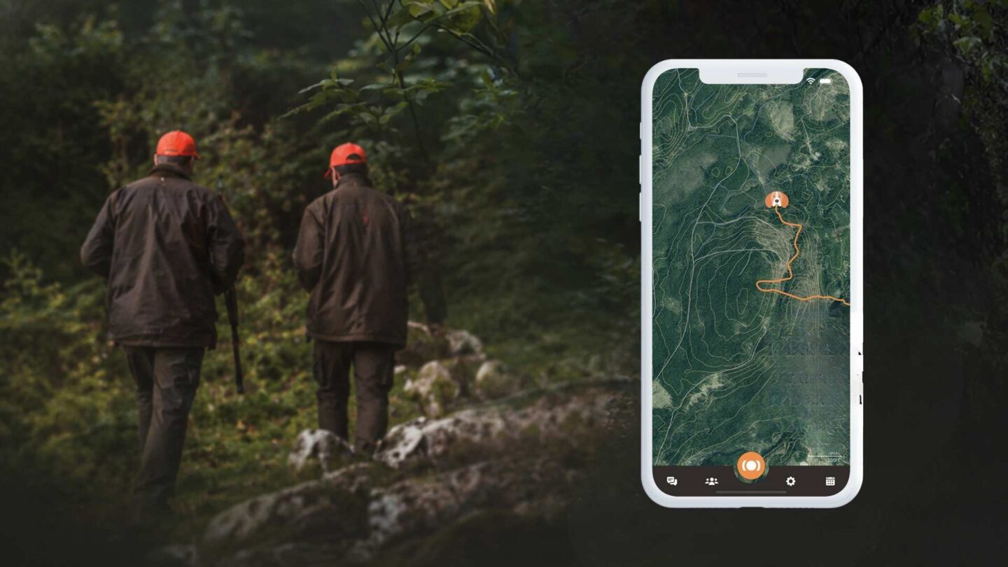Hunting dog wearing a GPS tracker while handler follows location in the mobile app